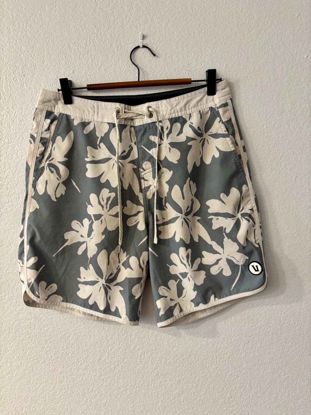Vuori Men's Cruise Boardshorts in Dusty Blue Plumeria print